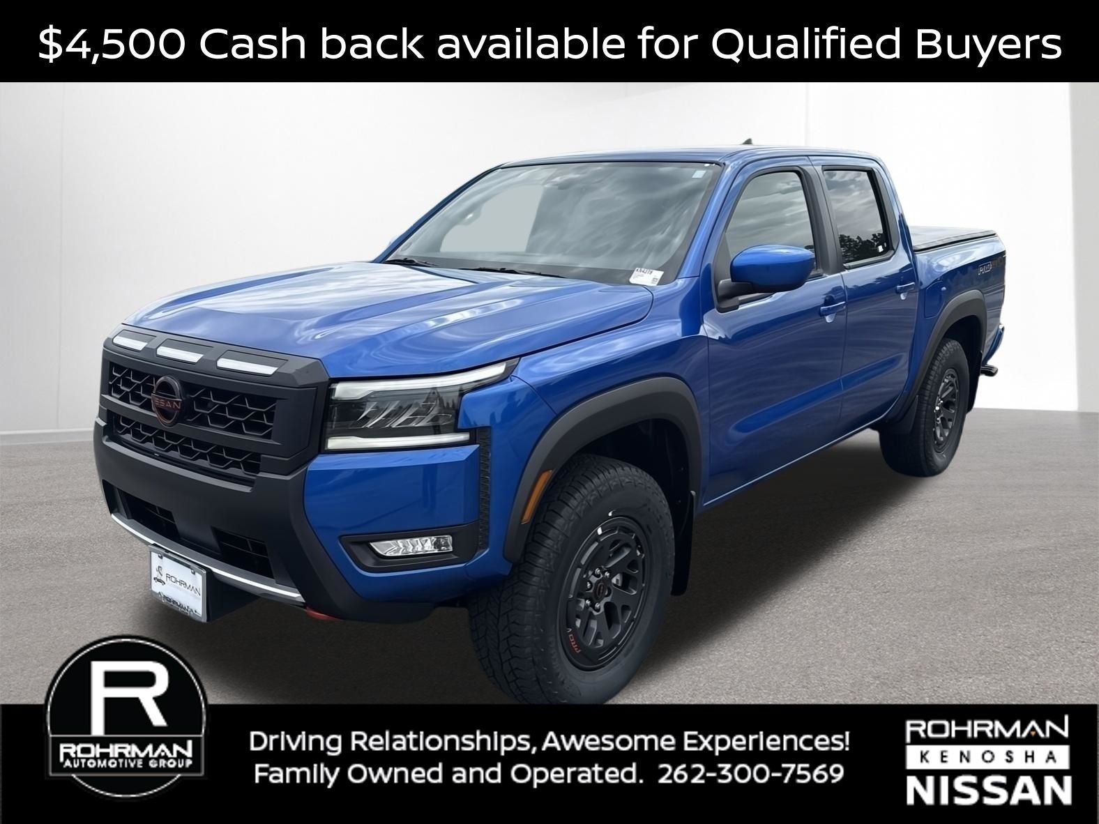 2026 Nissan Frontier PRO-4X in Bluestone Pearl — front three-quarter view