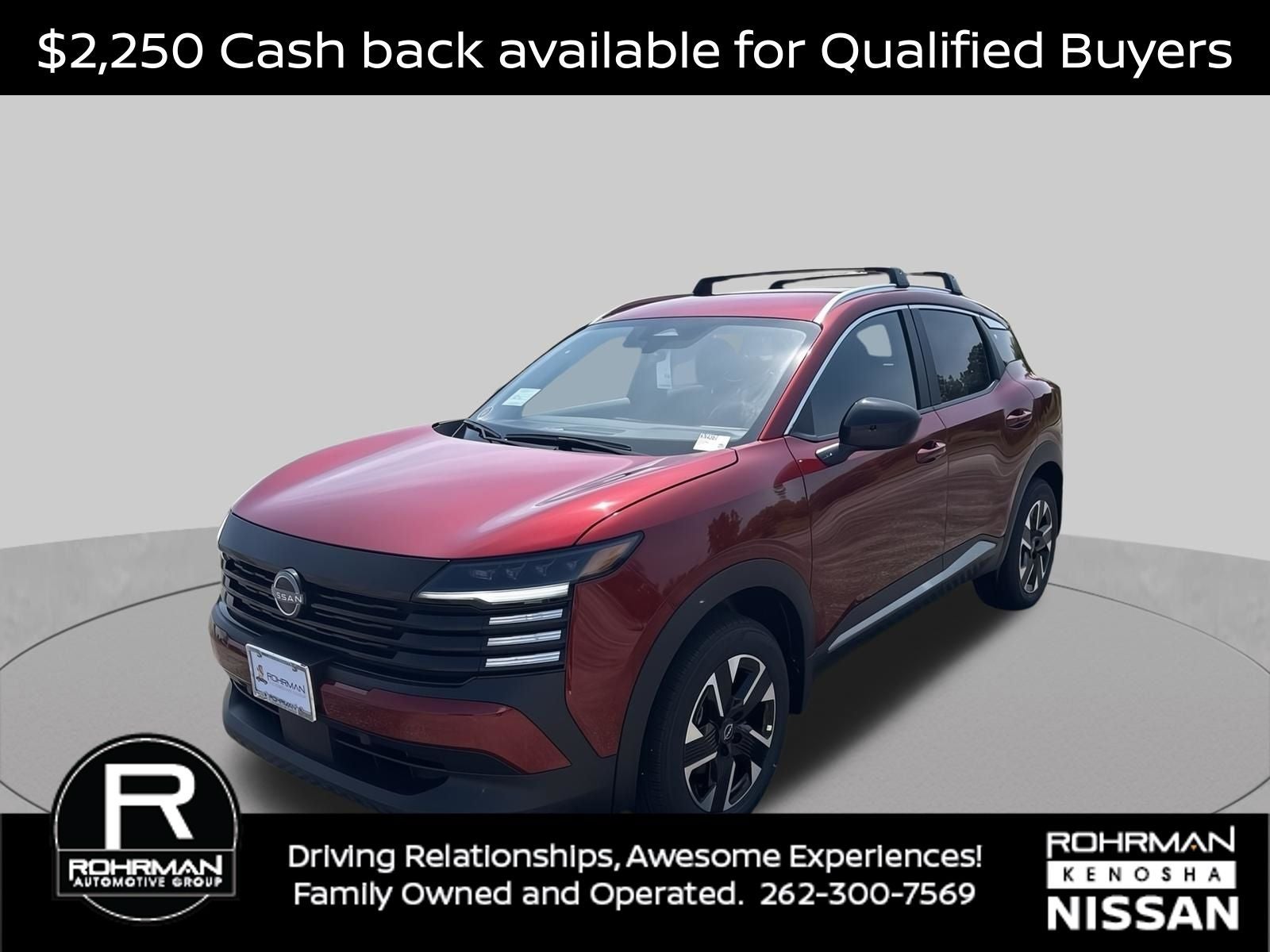 2026 Nissan Kicks SV AWD Cold Weather Package in Scarlet Ember Tintcoat — front three-quarter view