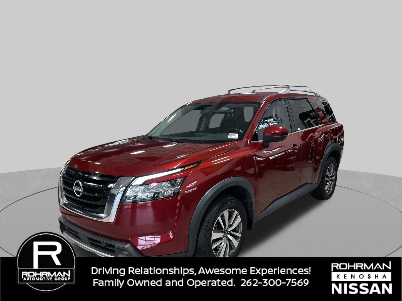 2023 Nissan Pathfinder SL in Scarlet Ember Tintcoat — front three-quarter view